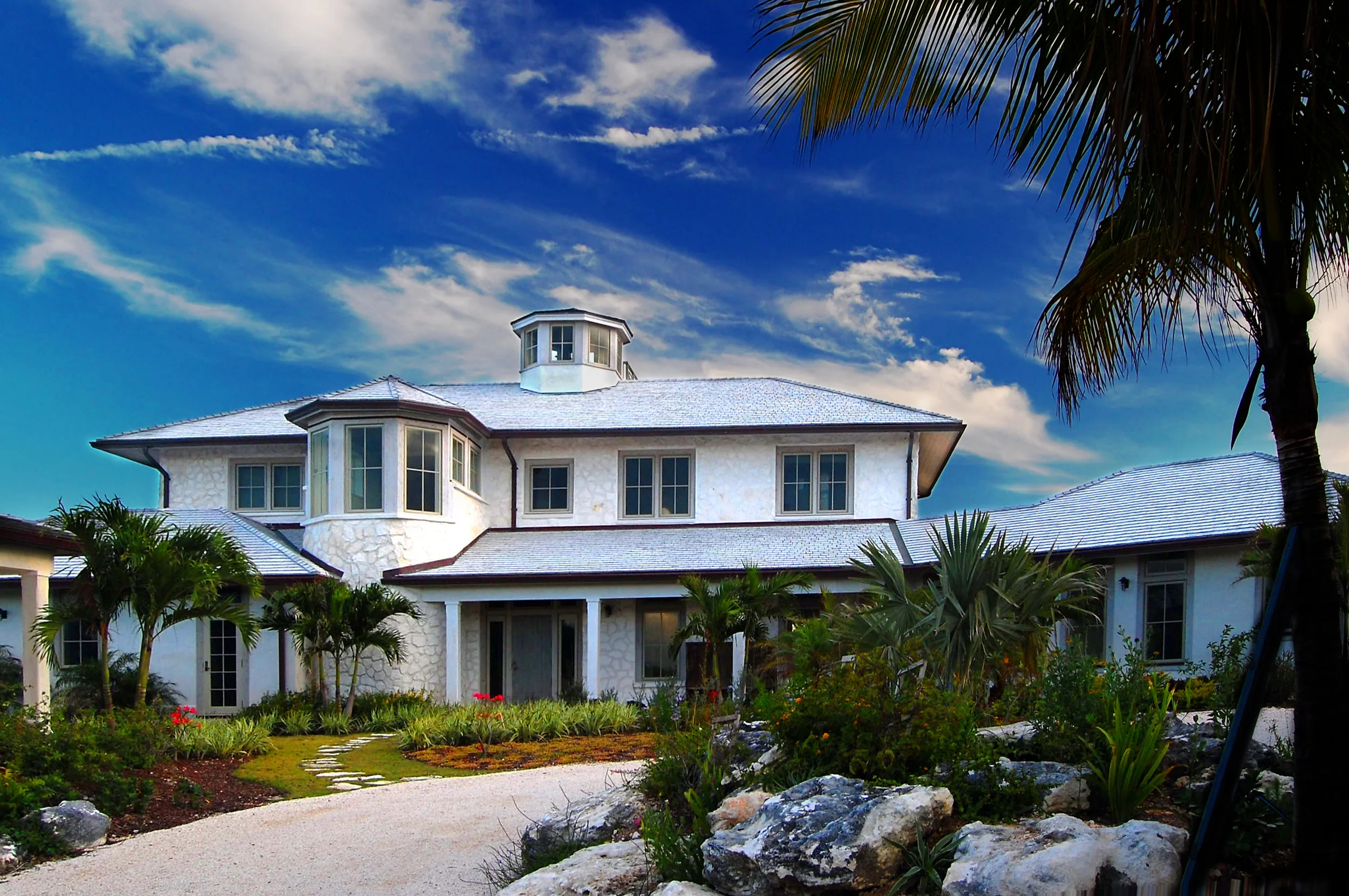 Beachfront Estate Bahamas Front by HDS Architecture