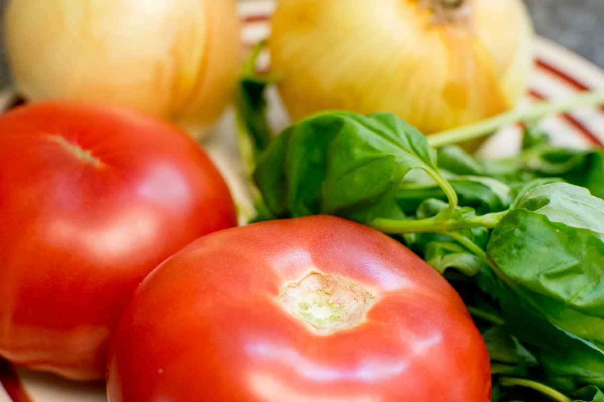 I cut up tomatoes, spinach, onion, garlic, and added more pepper along with thyme and oregano to taste. 