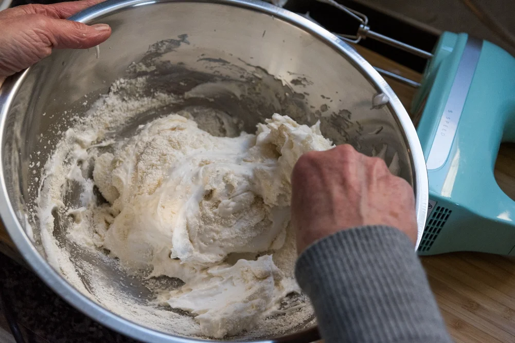 Gently folding in the dry ingredients