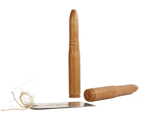 Pair of WWII Shell Cases, 2010, 7 ¼ (l) x 1 (diameter) in each, cherrywood