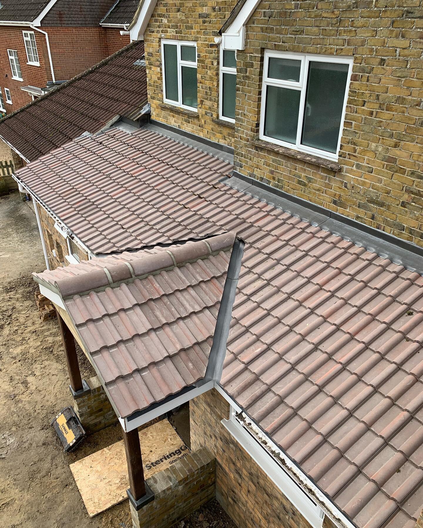 Redland Double Roman &amp; Plain Tiles in Breckland Brown with lead flashings #slatersroofingltd #lead #leadporn #roofing