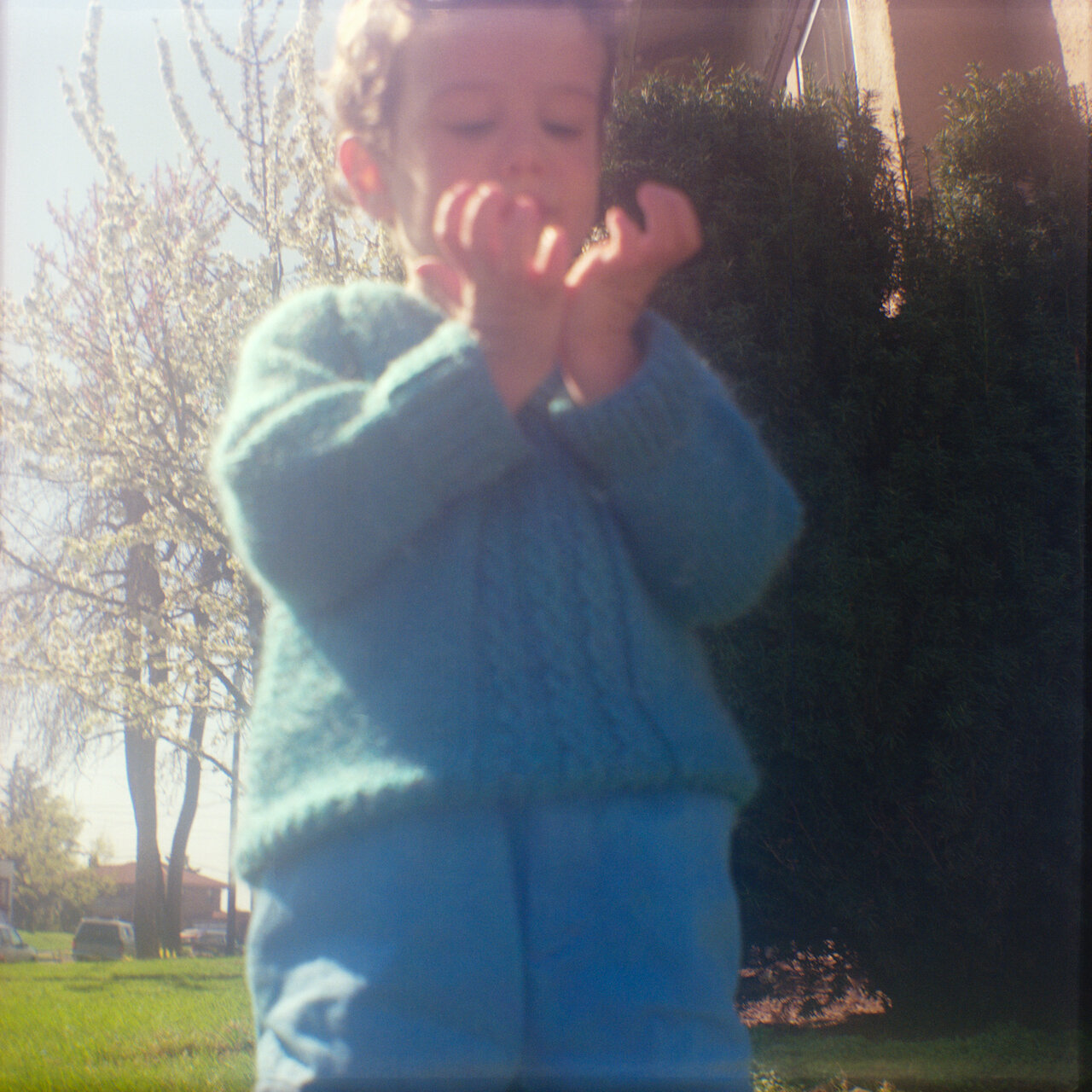 Ben Looking at Hands in the Light, 1990