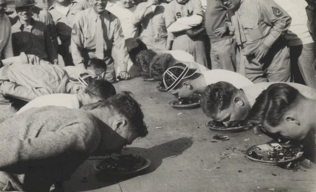 A still photograph from the First Annual Humble Pie Eating Championship. Of course, every participant claimed they were the winner.