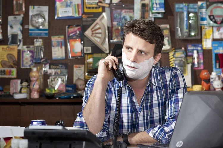 The well-groomed founder of Dollar Shave Club, Michael Dubin, poses for a portrait in company offices in 2012. Photo: Dan Krauss/WSJ