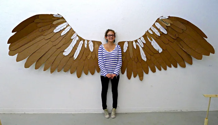 isabelle with cardboard wings