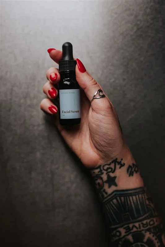Facial Serum (regular) in hand.jpg