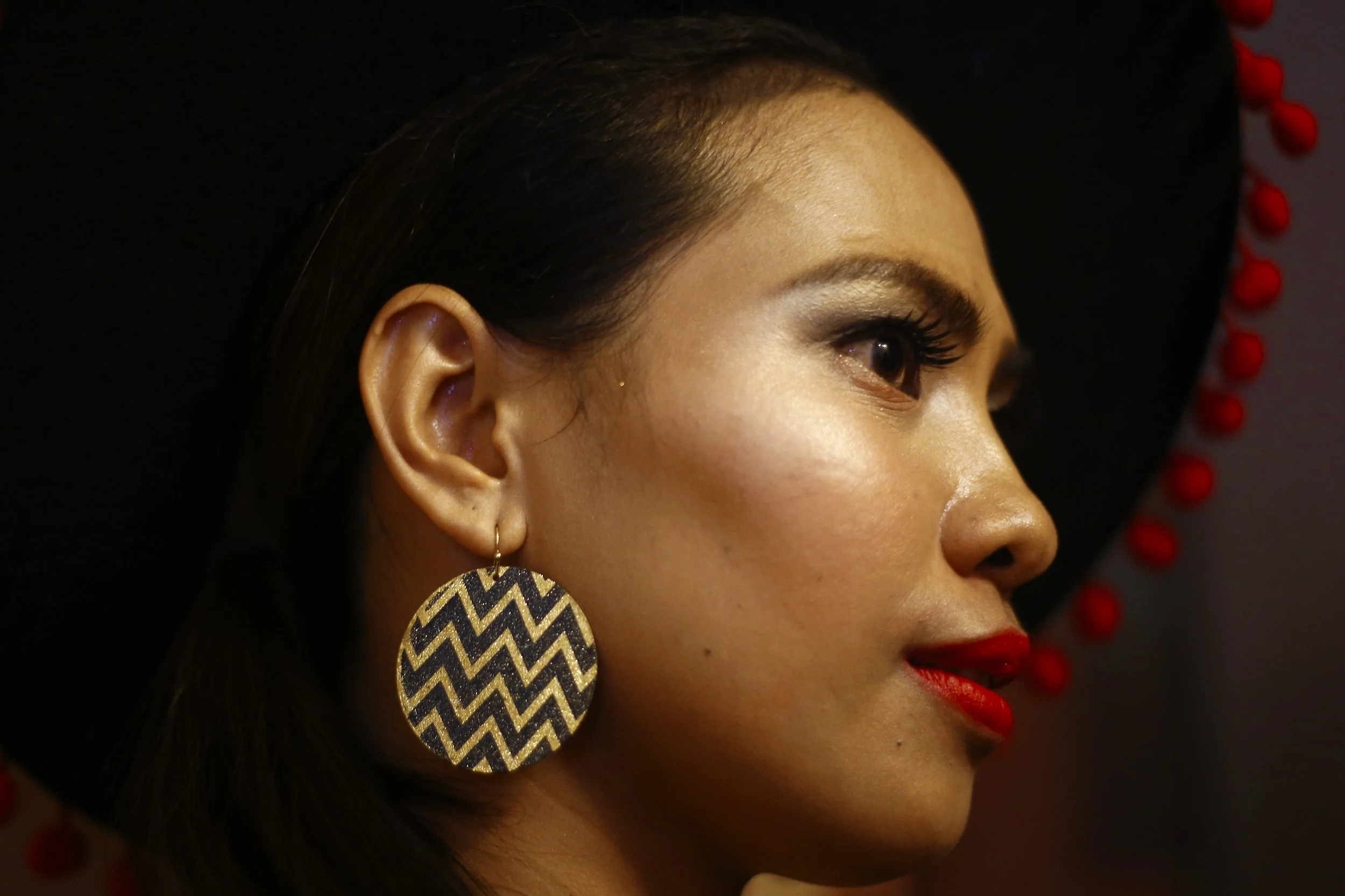 A contestant waits backstage at Rampstar 2018, a beauty pageant organised largely for Filipino domestic helpers in Singapore, July 29, 2018. REUTERS/Feline Lim