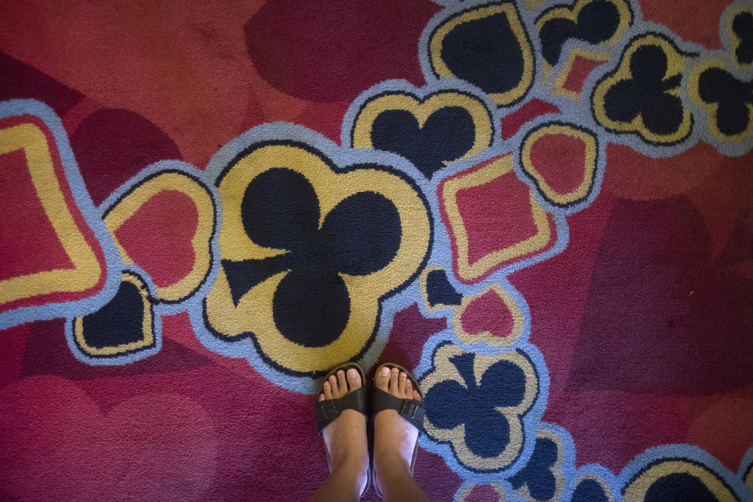 Gambling motifs adorn the carpeting of the M/V Amusement World, which was built in 1967, as pictured on March 15, 2018.
