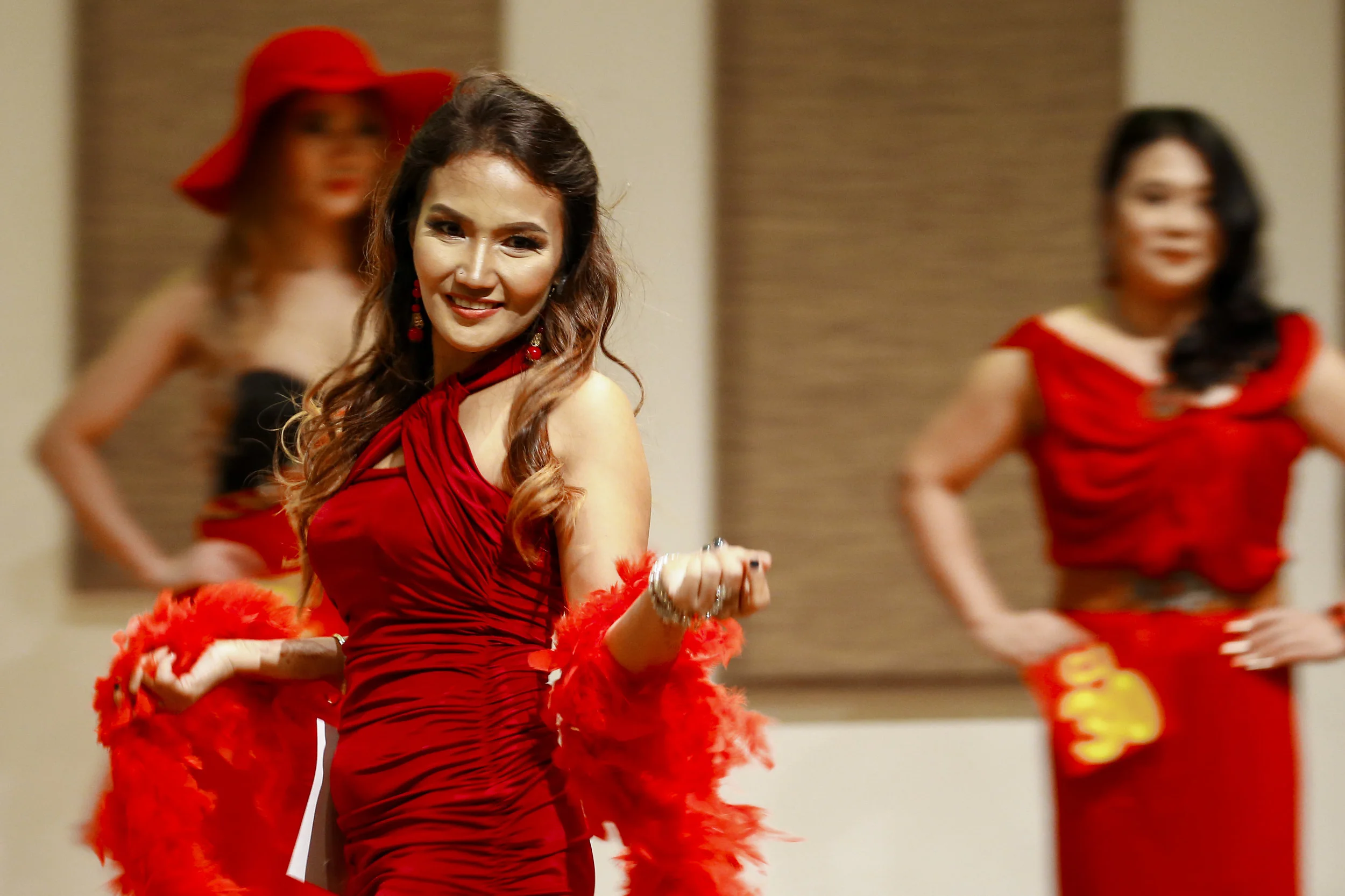 A contestant performs her catwalk on stage at Rampstar 2018, a beauty pageant organised largely for Filipino domestic helpers in Singapore, July 29, 2018. REUTERS/Feline Lim