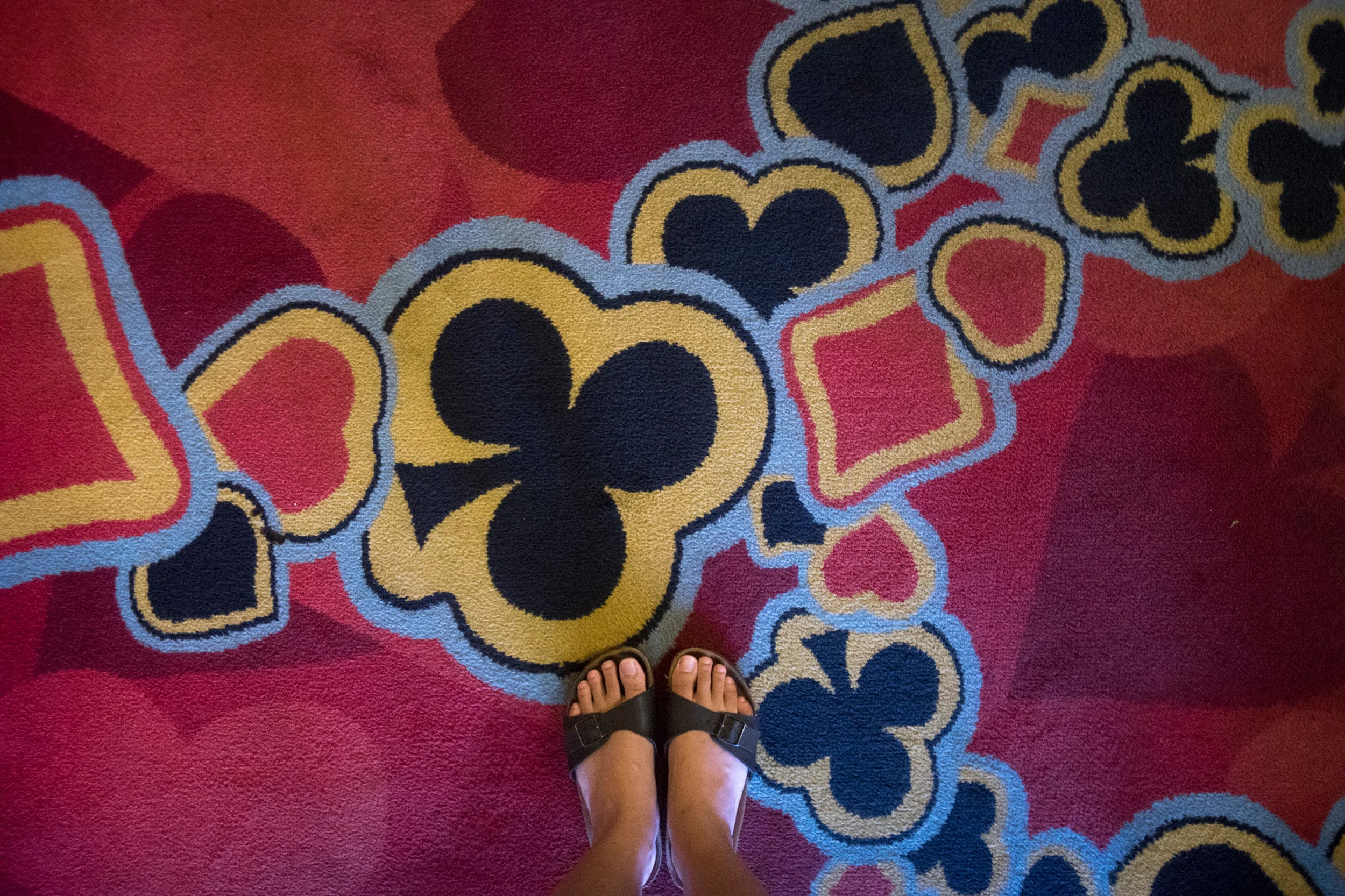 Gambling motifs adorn the carpeting of the M/V Amusement World, which was built in 1967, as pictured on March 15, 2018.