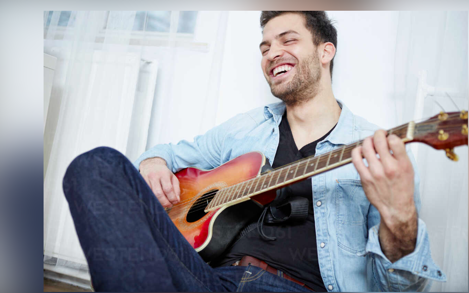 Happy Client_Guitar Player.PNG