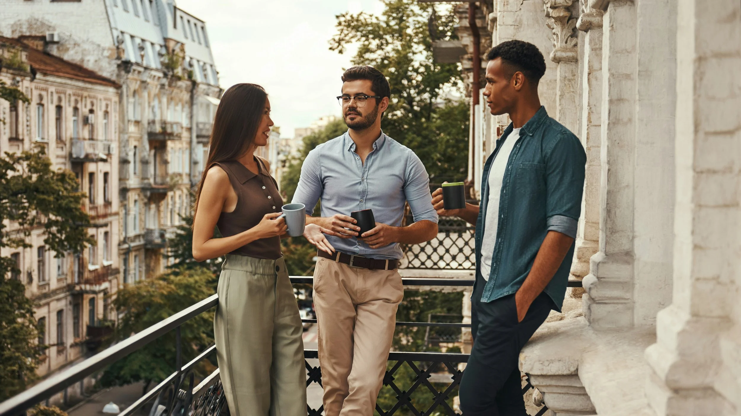 People Talking Balcony getty-images-LM9wHFZByV8-unsplash.jpg