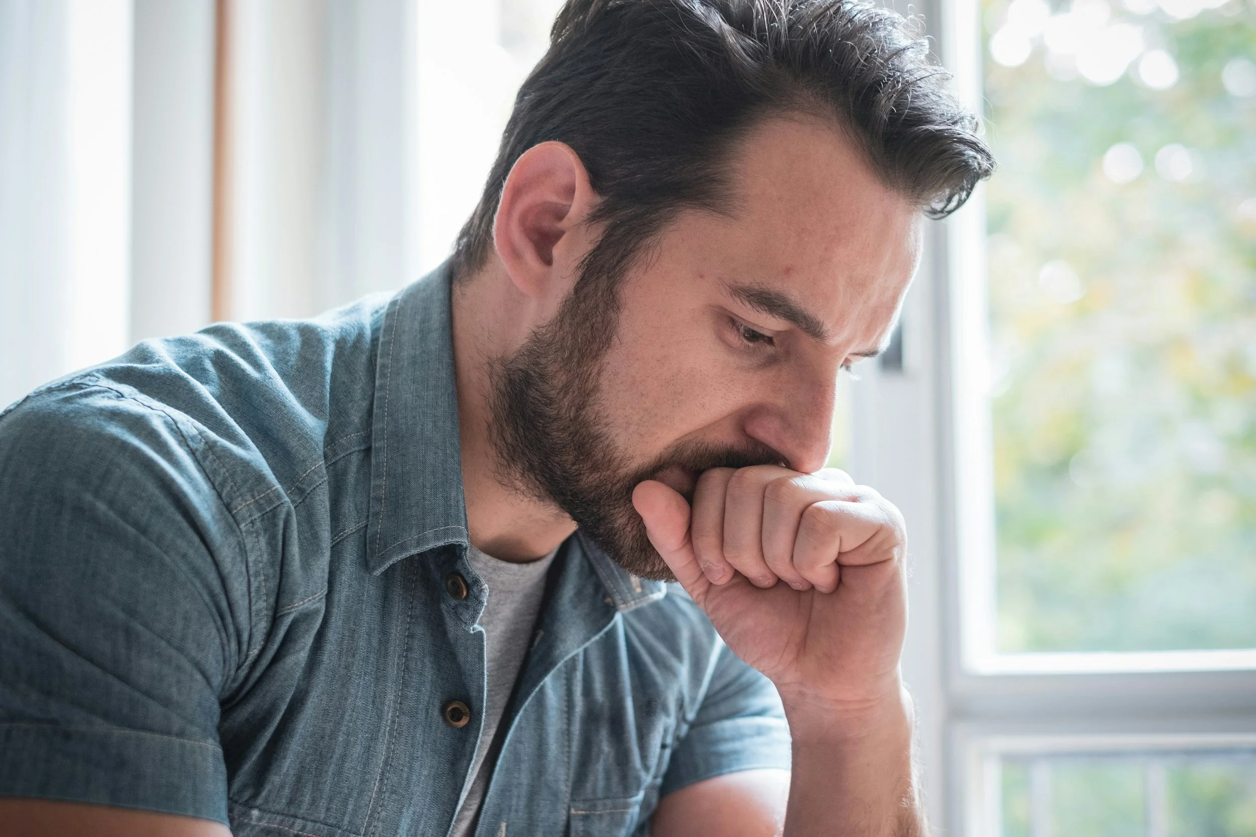 Troubled Man getty-images-IMX-ZzzS-uE-unsplash.jpg