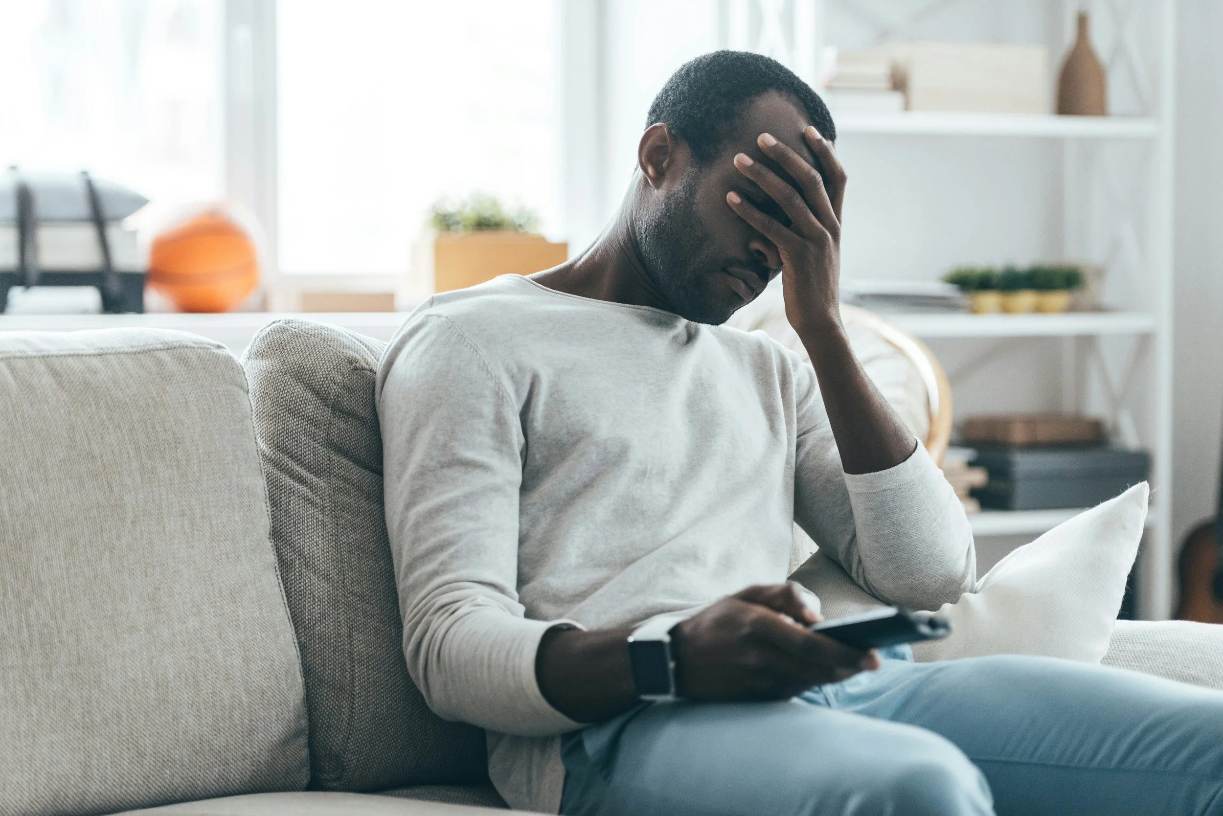Upset Man w Bad News getty-images-PbtJKXZpkHM-unsplash.jpg