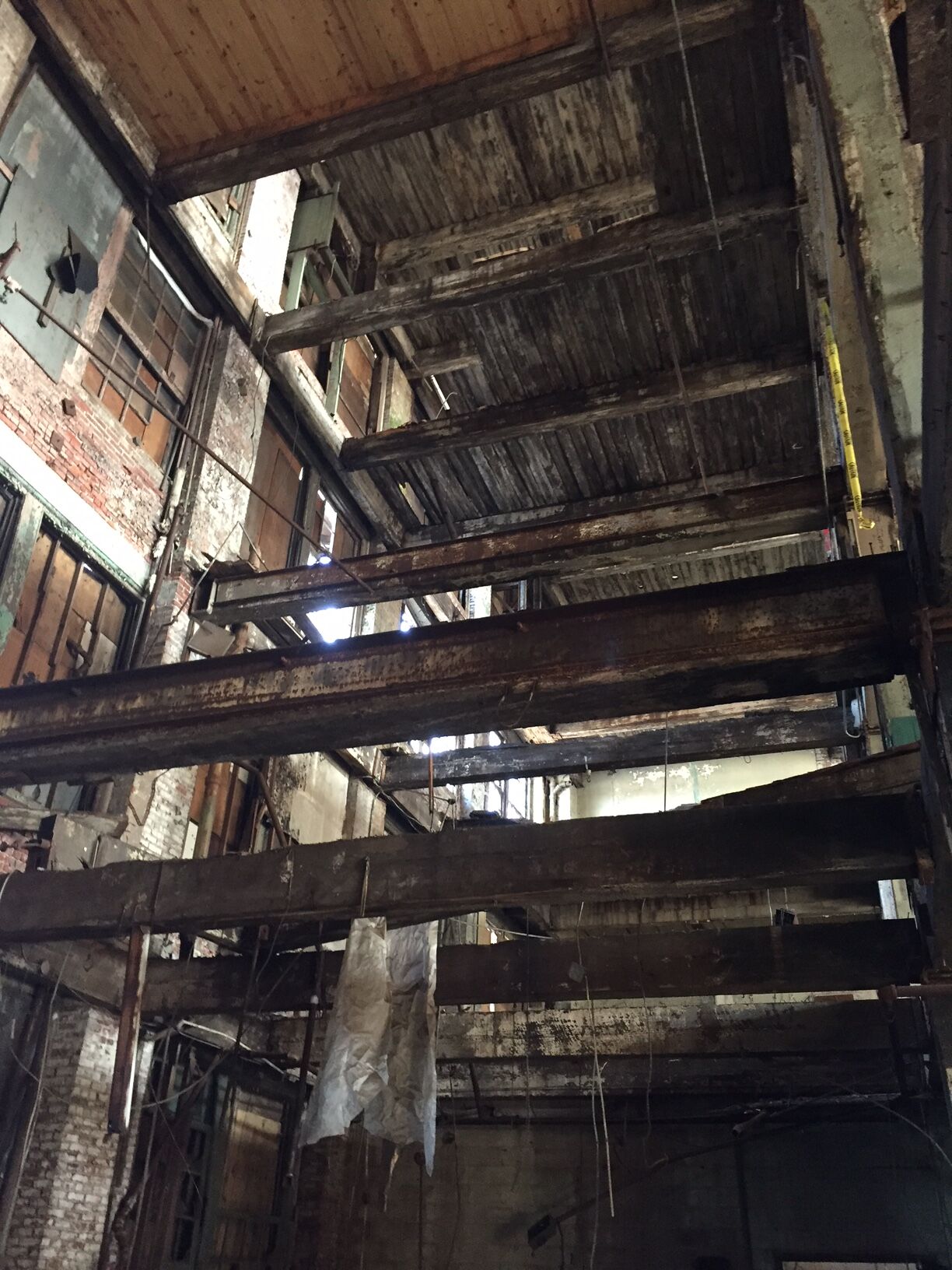 View looking up from the first floor through the five stories of the factory. 