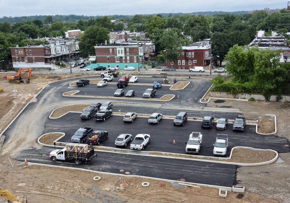 Aerial view of paved parking lot.