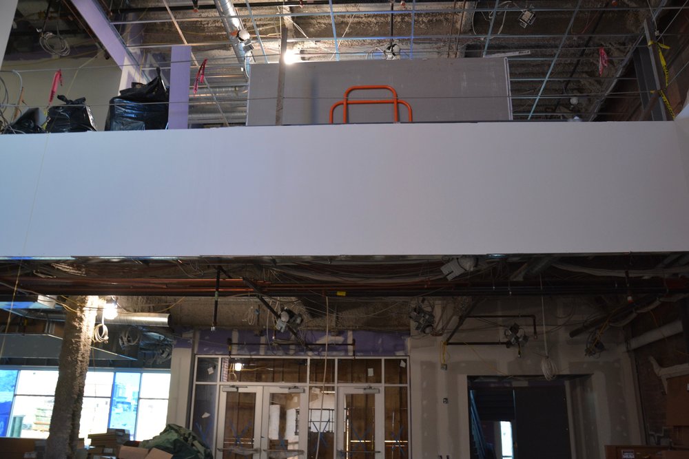 View from the lobby looking up at the second level. The lobby ceiling is two stories high.