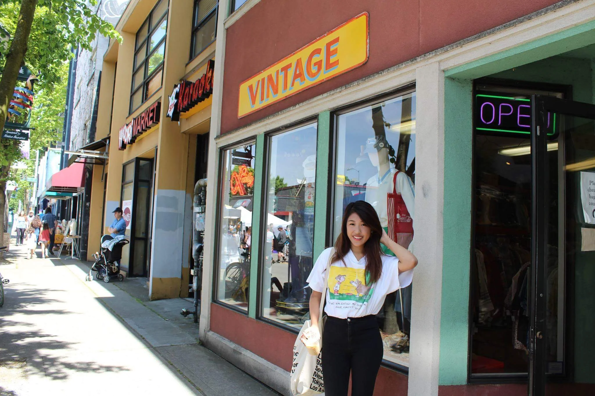 In front of a vintage store at the University village of University of Washington. We were sad that the cherry blossoms were no longer in season. 