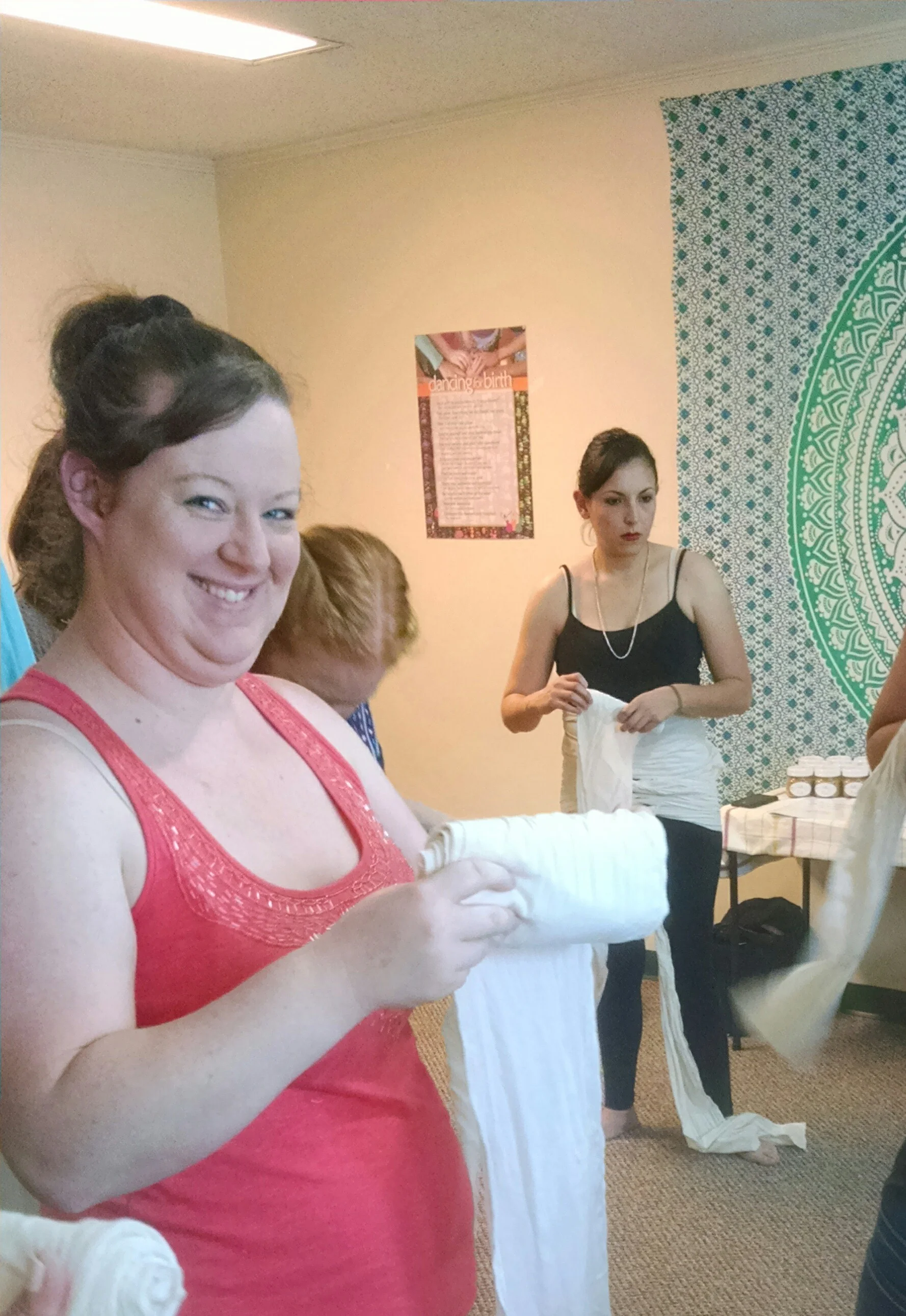 Janell and Sofia practice Bengkung Belly Binding