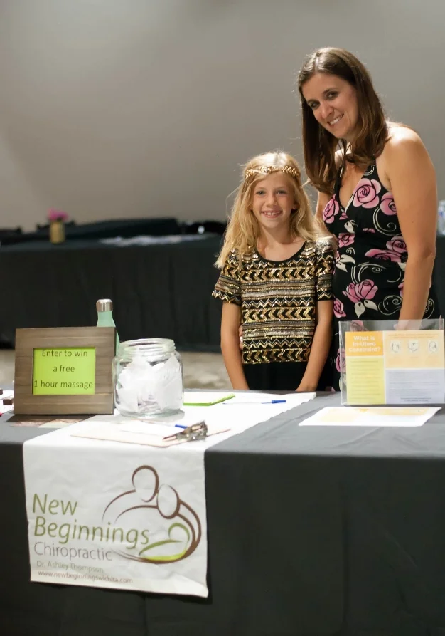 Dr. Ashley Thompson and her daughter representing New Beginnings Chiropractic, west Wichita's provider of prenatal and pediatric chiropractic care.