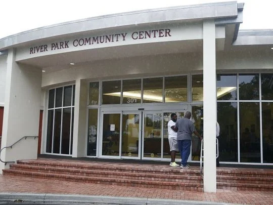 FILE - Resident Antonio Dumornay and resident Curtis Lawson speak after a meeting Wednesday, June 8, 2016 at River Park Community Center in Naples, Fla. The residents assembled to discuss the city-approved construction of a future 7-Eleven in River Park. The project has been met with controversy as representatives from the convenient store franchise fielded questions. (Photo: Corey Perrine/Naples Daily News)