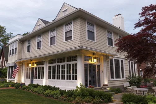 The Knollwood after a complete porch restoration, with new foundation plantings just installed by Joe Pizzirusso of New Creations Landscape