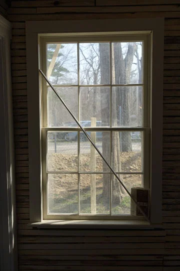 McGiff also created new windows from scratch, where windows were completely missing, matching the delicate muntins of the original windows. Storm windows will make these windows as efficient as any new insulated glass window.