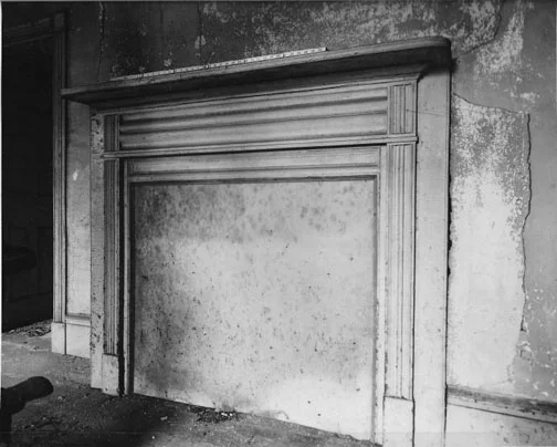 This 1962 photo shows the condition of the first floor front parlor.