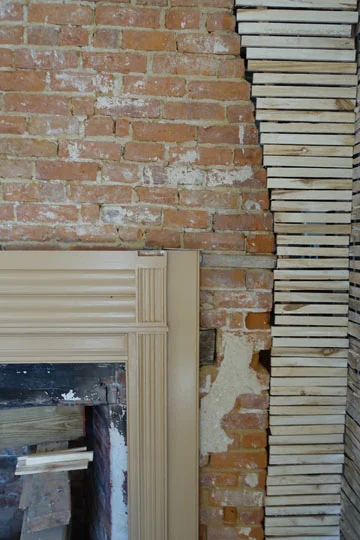 The first floor parlor today—new lath is in place for plastering, and the mantel shelf will be reinstalled in the coming weeks.