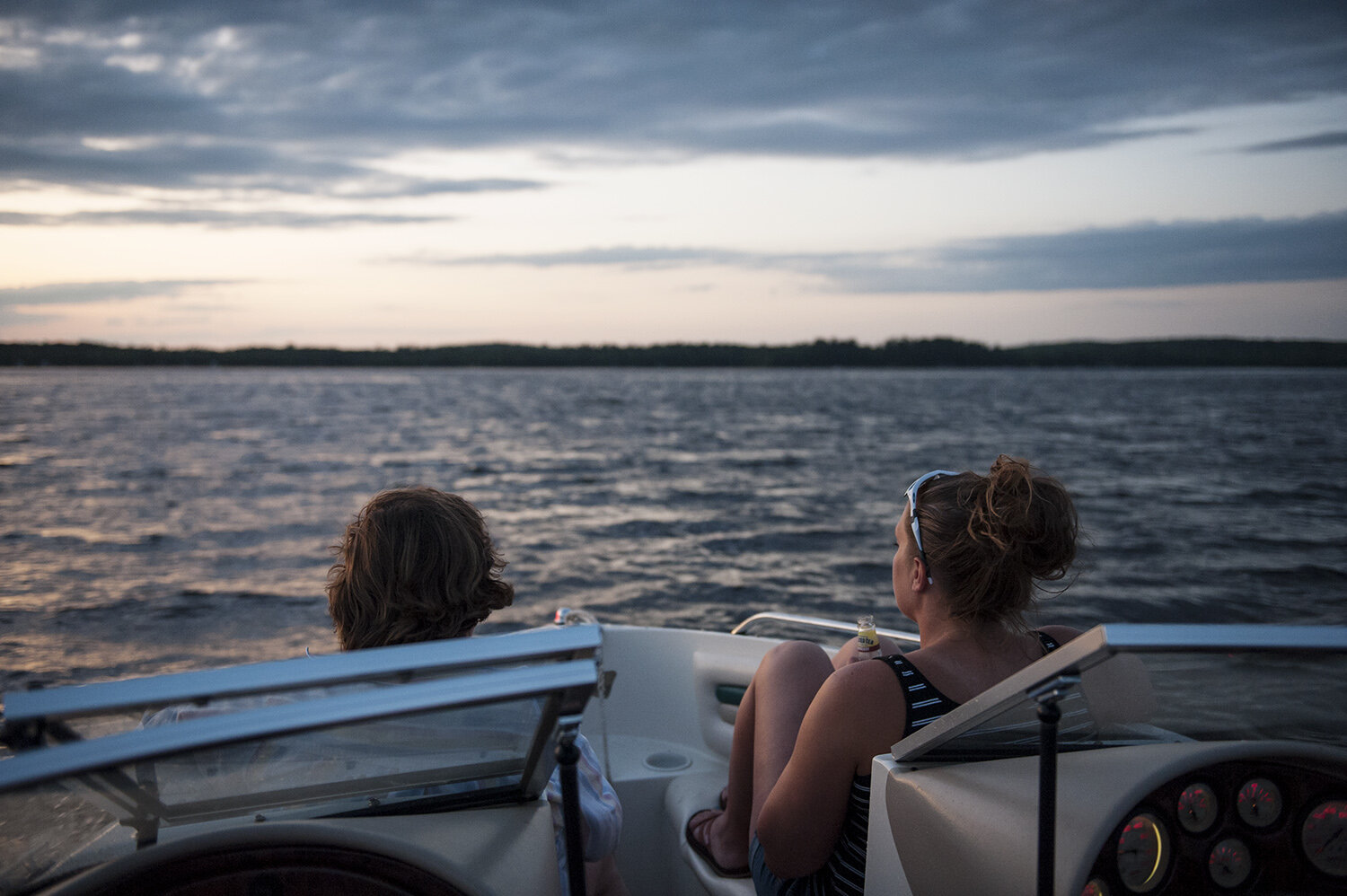 A quiet sunset moment shared between Bethany and her mother on the lake.