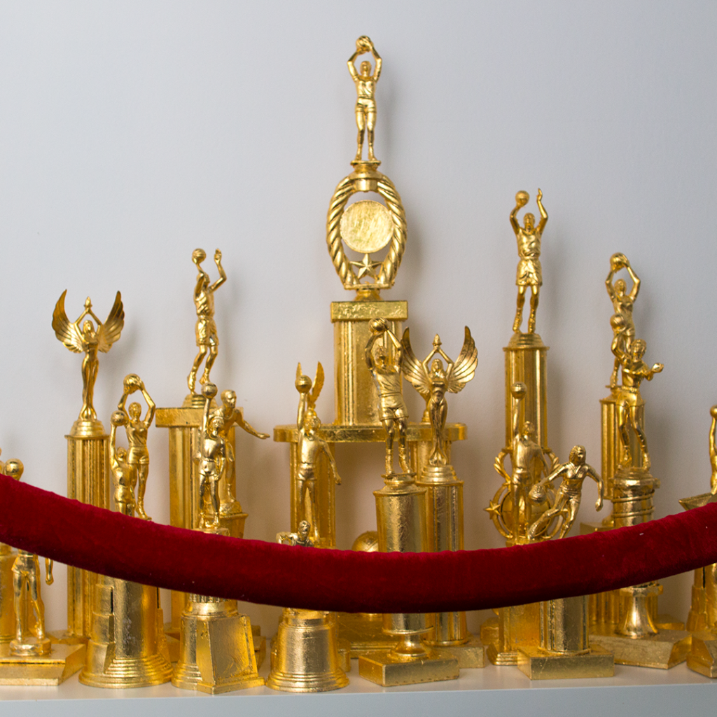 Victor-Solomon-Roll-With-The-Winners-22-Gilded-trophies-36-x-24-1024x1024.png