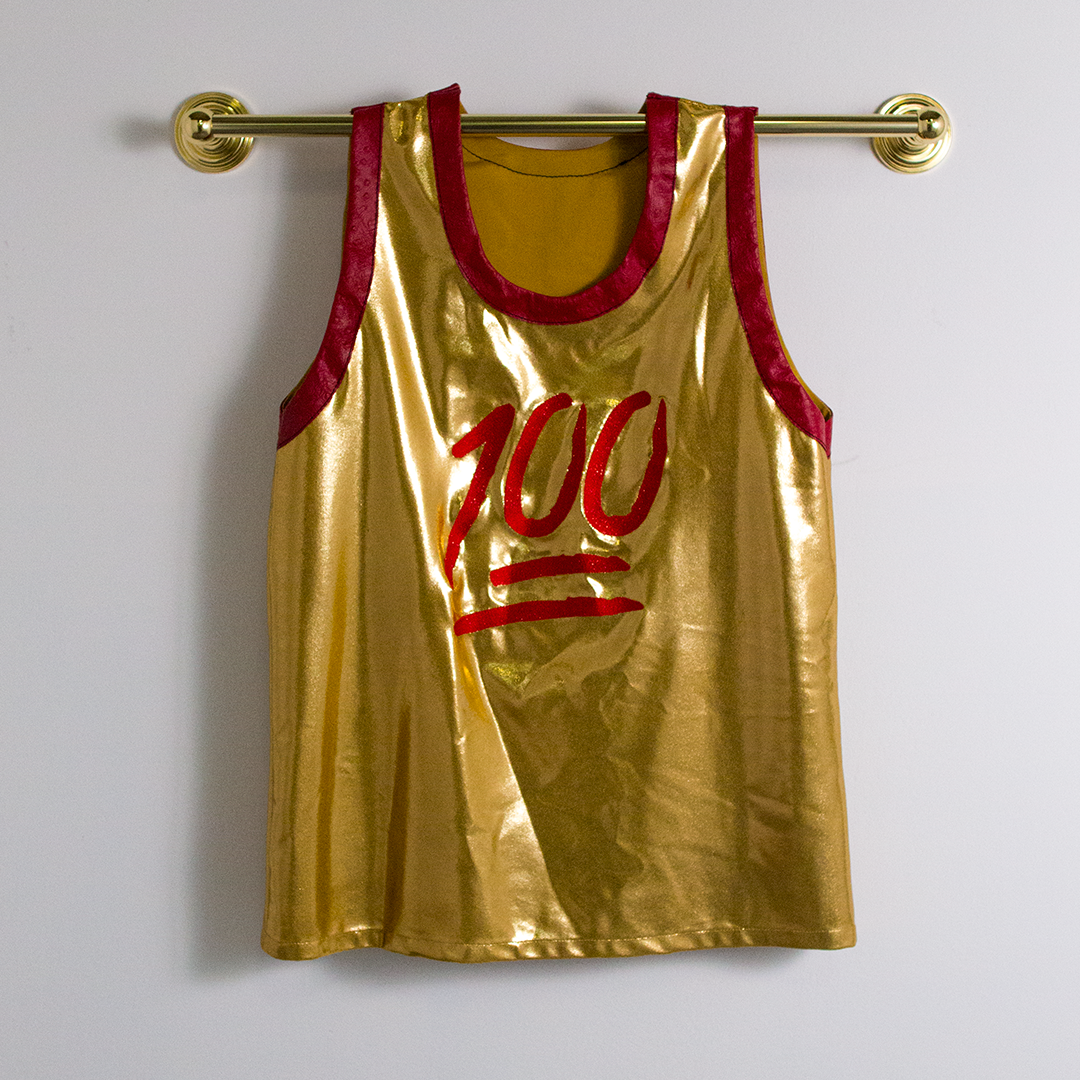  Victor Solomon, "Hunnit." 2016. Gold lycra, red ostrich trim, embroidered embellishment. 36 x 24 in. 