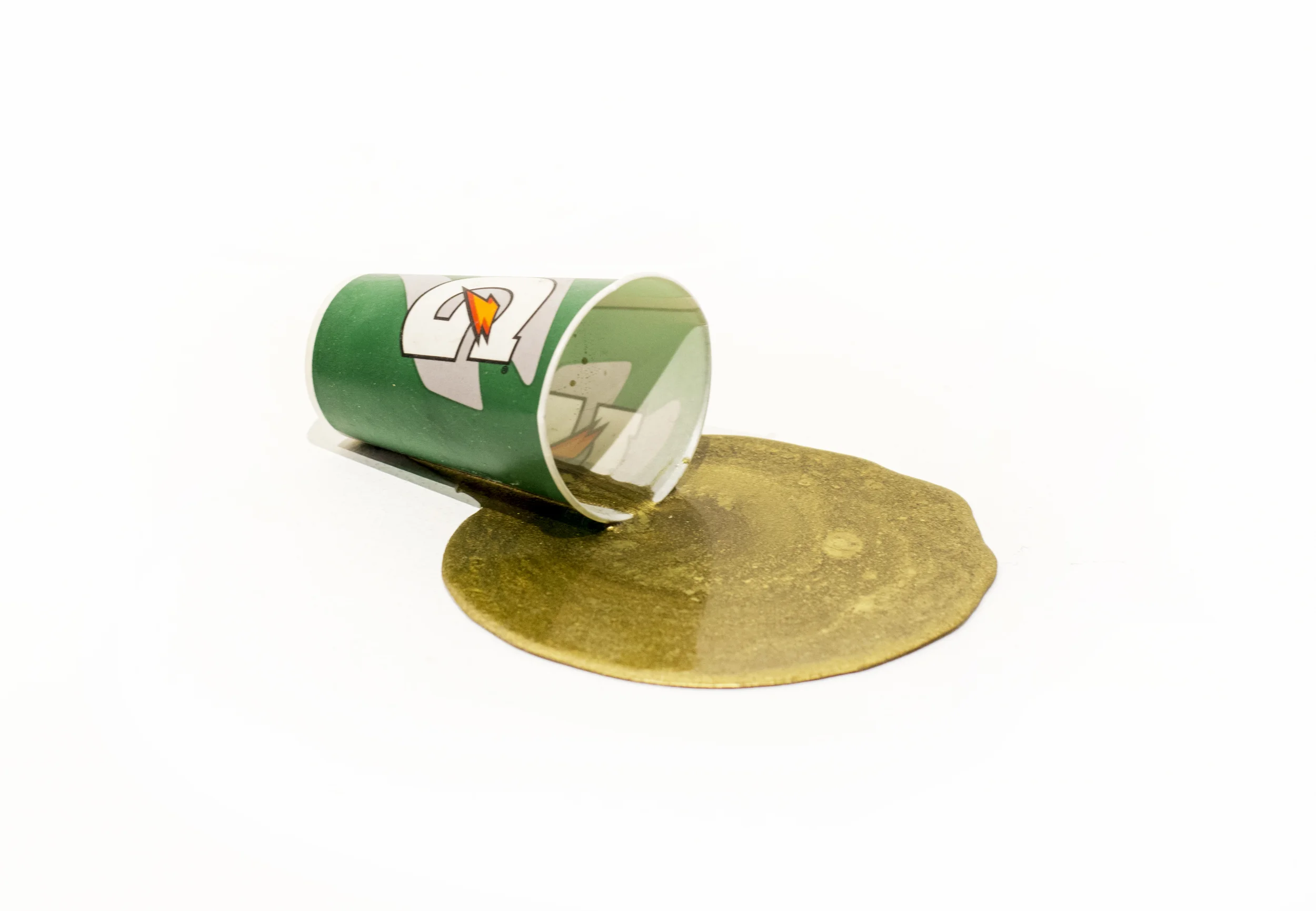 Victor Solomon, "It in you." 2016. Gatorade cup, epoxy with gold pigment. 4" with variation.