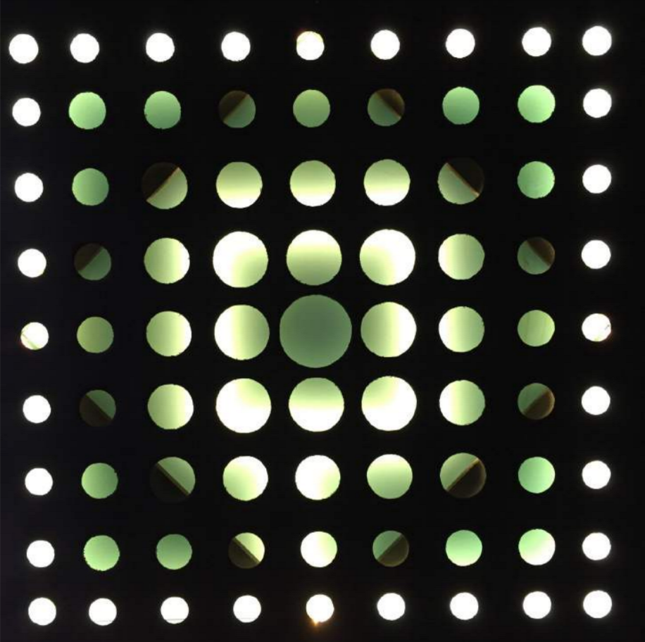 Ogulcan Kush. "TBA. " 2016. Spray paint on canvas and LED's. 36 x 36 in.