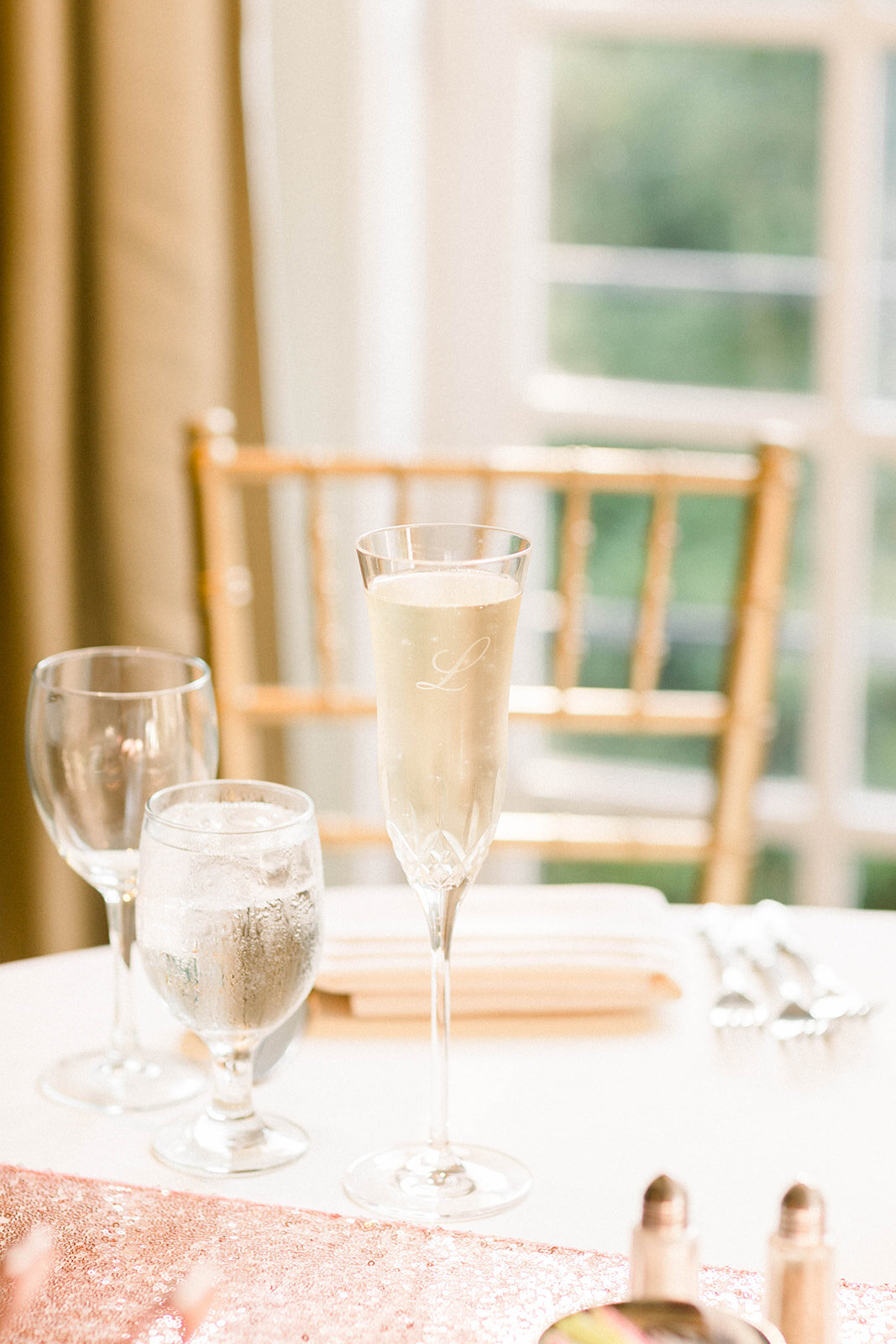 Personalized wedding champagne glasses: Longue Vue Club Wedding captured by Abbie Tyler Photography