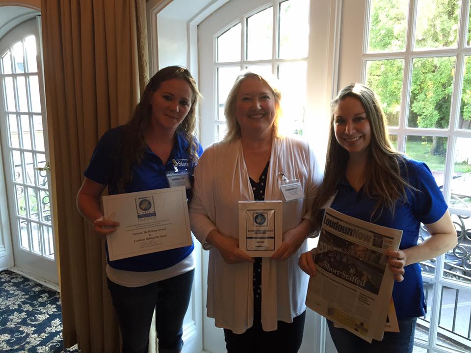 Loudoun Habitat ReStore representatives receiving the award at Loudoun Now's event for all the 2017 "favorite" winners. Pictured from left to right, ReStore Manager, Kristen Wolfe, Loudoun Habitat For Humanity's Executive Director, Therese Cashen and ReStore Donations Manager, Kellyn Larrabee.
