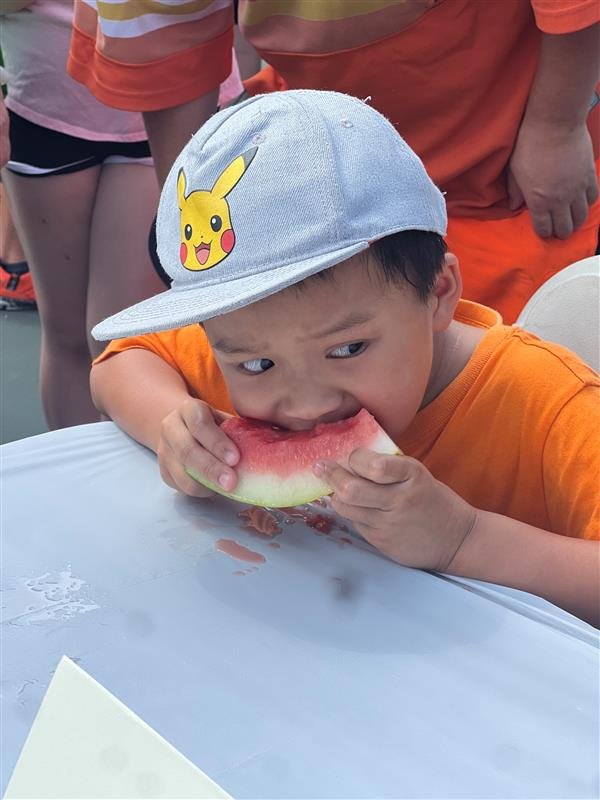 boy eating watermelon.jpg