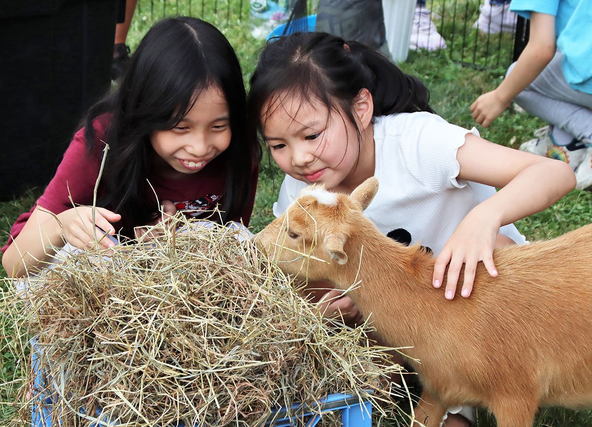 two girls and goat.jpg