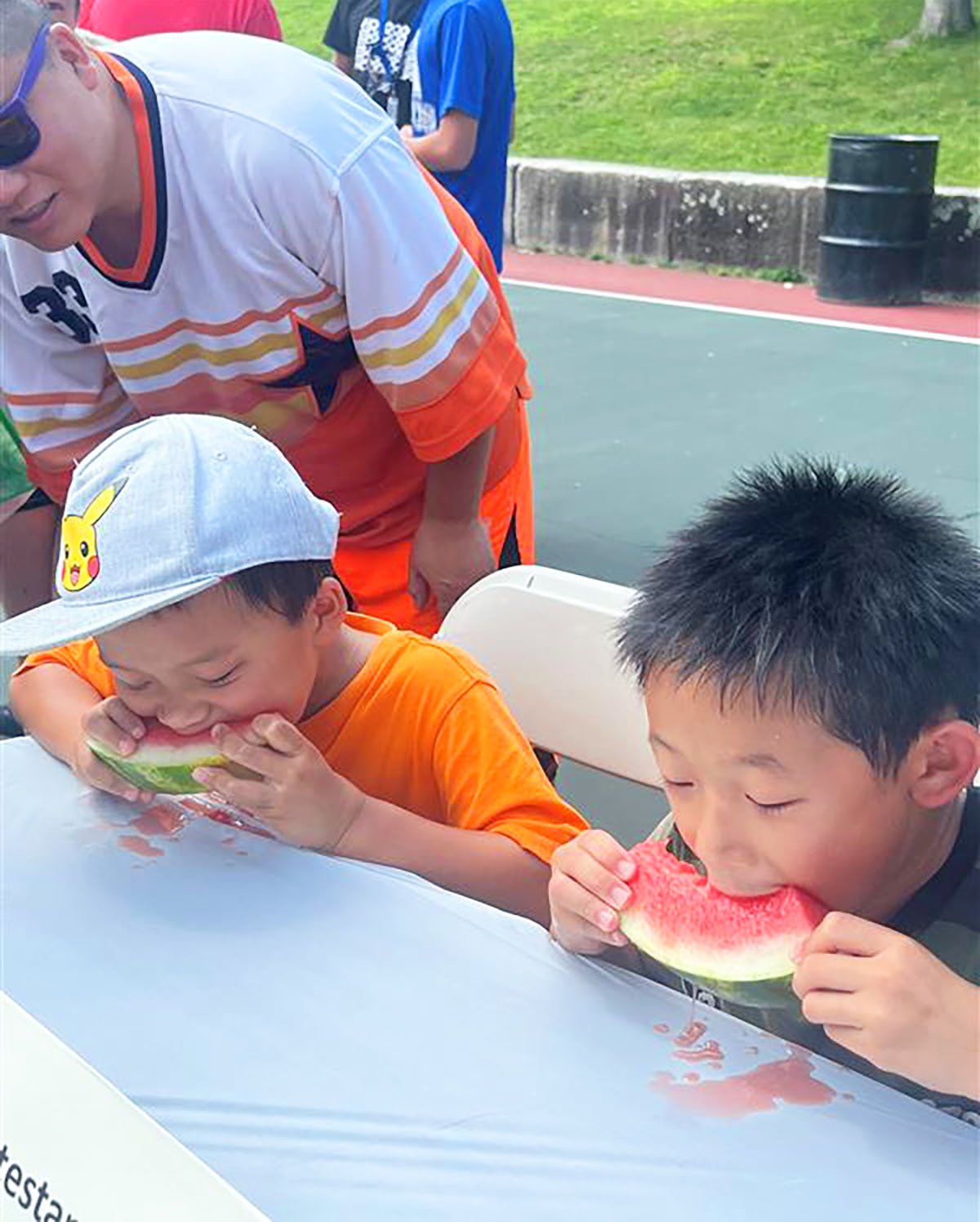 2 boys eating watermelon v1.jpg