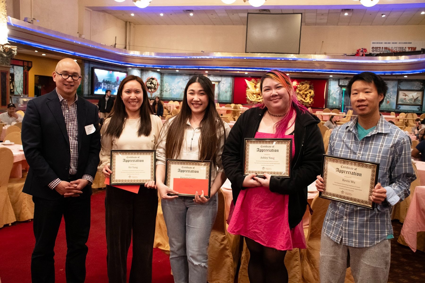 Kit Yung, Victoria Liang, Ashley Yung, and Kevin Wu receive 5 years of service awards