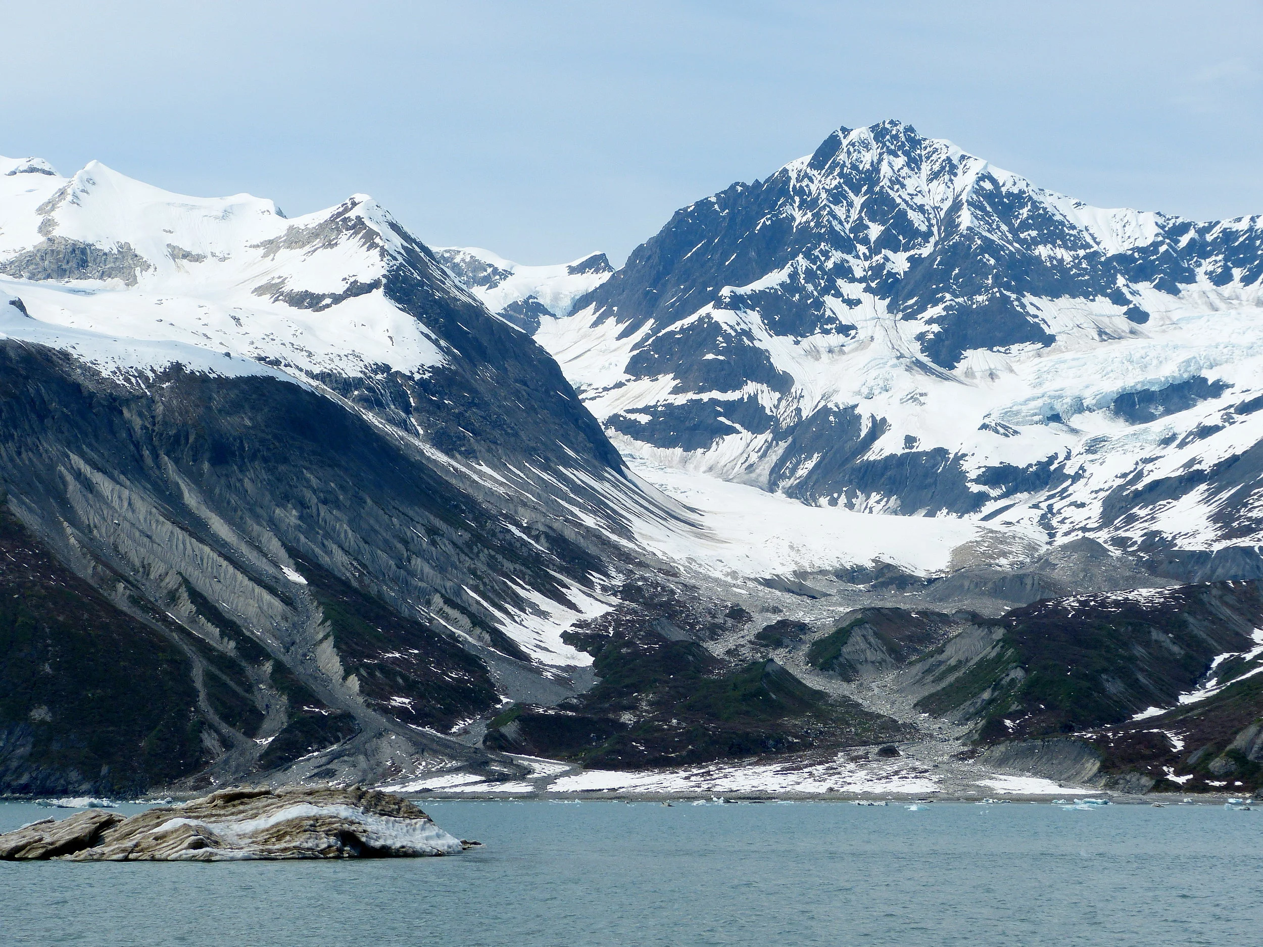 Glacier Bay is a raw young landscape, where receding ice gives birth to new salmon streams.