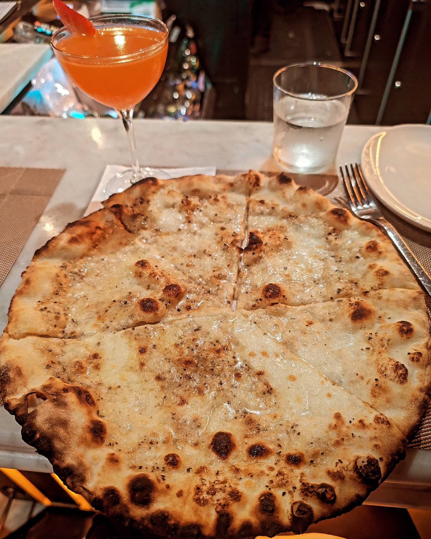 I've been on a #cacioepepe kick and finally had the chance to try @serafinanewyork #champagne pizza paired with this #strawberry #basil #martini perfect after a busy day! I've been a fan of this restaurant forever from my first bite in 2008 ay 55th, 