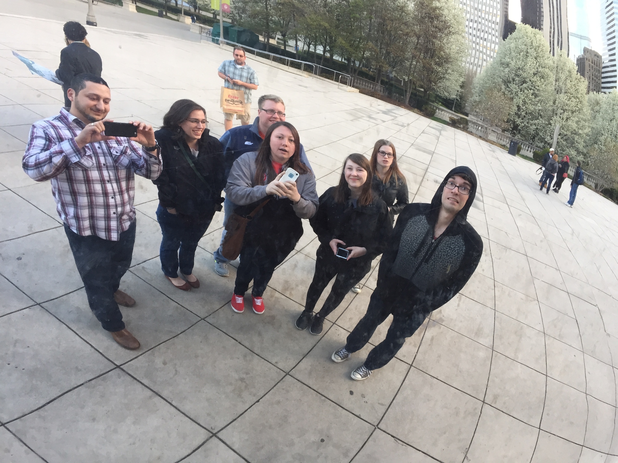  Dr. Okdie and some ANT lab students taking a selfie in the Bean at Millennium Park in Chicago. 