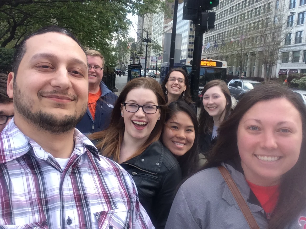 Dr. Okdie and some ANT lab students taking a selfie in the Bean at Millennium Park in Chicago.
