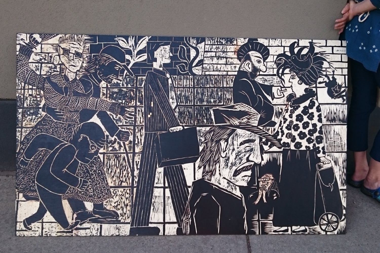 The wooden block, all carved and inked - mine is the little man on the left.