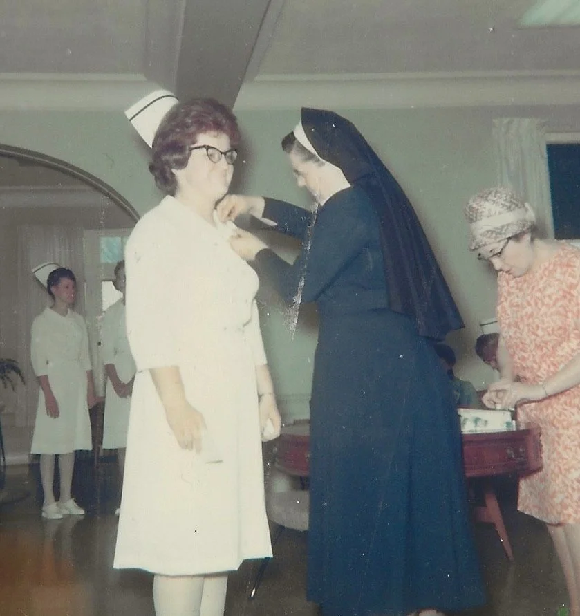 Mary receiving her nursing degree.