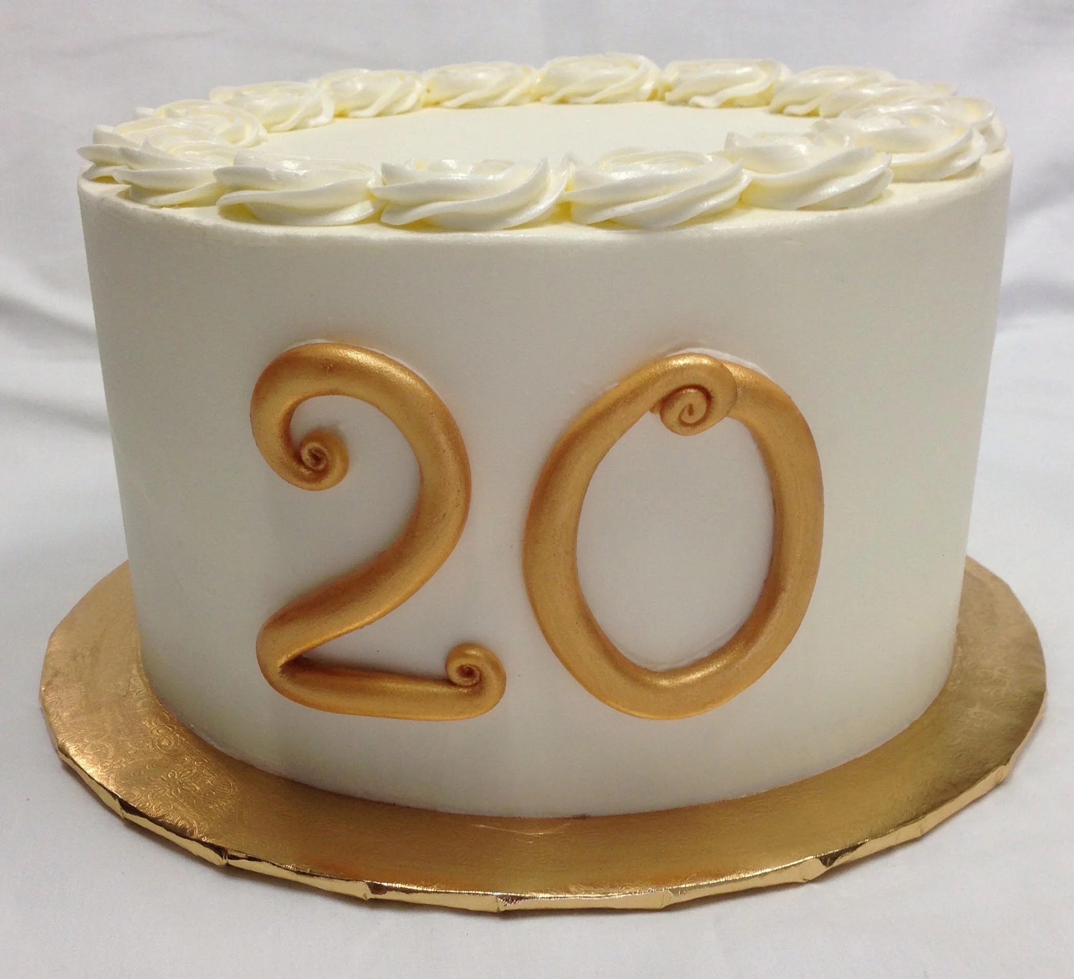 Buttercream with gold Fondant numbers