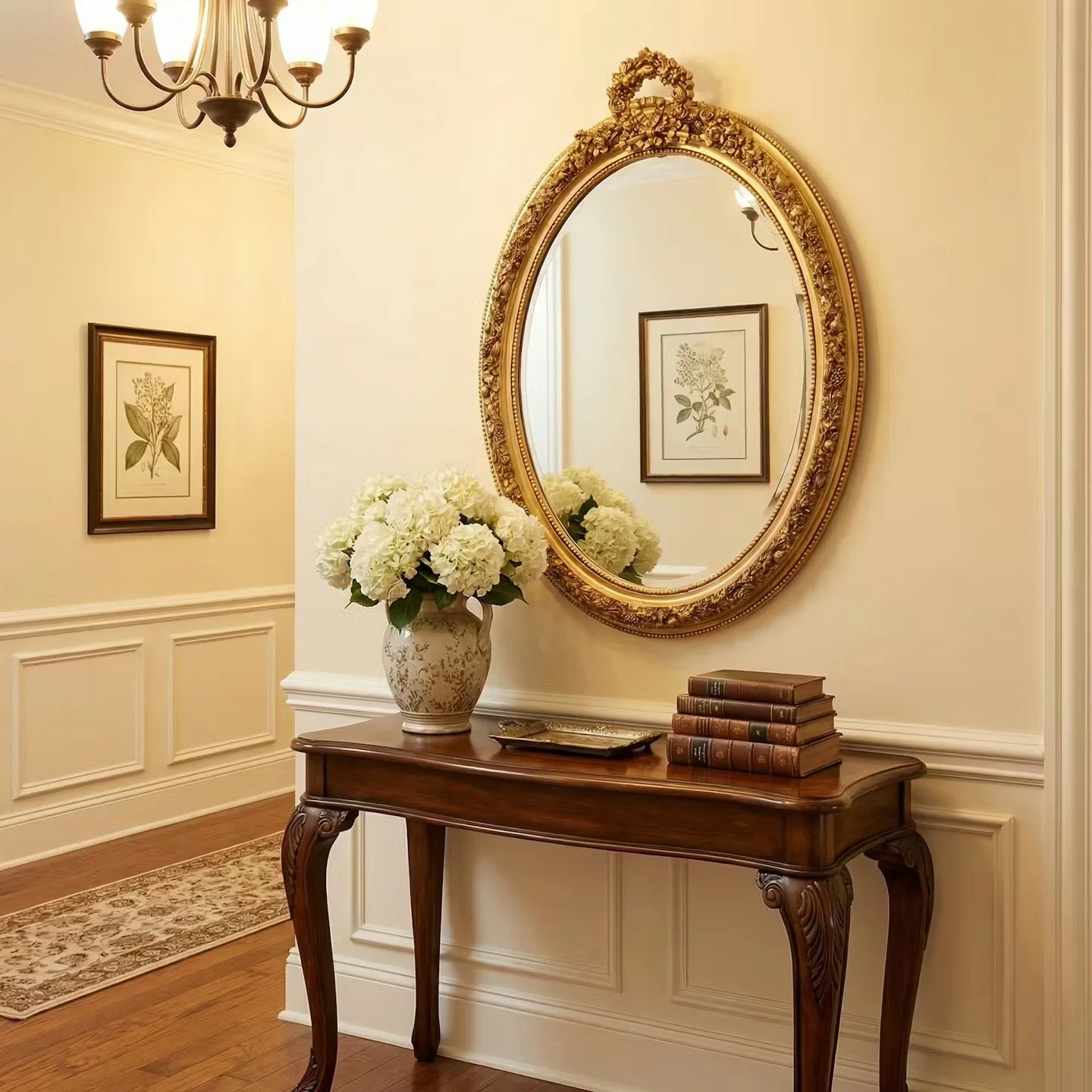 Medium sized oval mirror with gilt gold frame