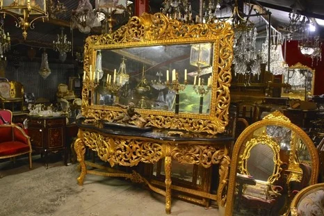 HAND CARVED WOODEN FRAMED MIRROR