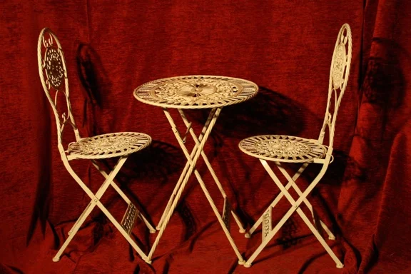 GARDEN SET WROUGHT IRON TABLE AND TWO CHAIRS